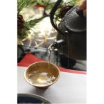 Traditional Japanese sake pot and cup set, symbolizing cultural harmony