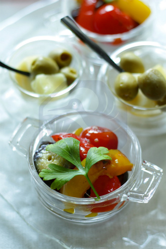 Ratatouille-style vegetable stew served in a bowl, ideal with room-temperature or warmed sake